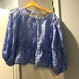 Free people top in lilac! Never been worn!